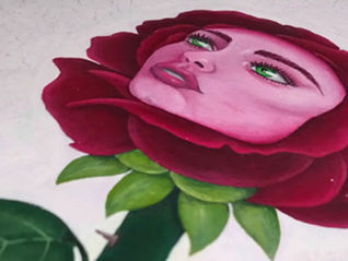 Painting of a rose with a human face on a white background