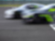 two-race-cars-battle-on-race-track-crossing-to-the-2023-11-27-04-59-53-utc_edited.jpg