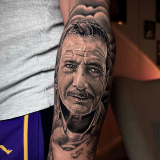 Extreme skin texture detail realism portrait tattoo of an elderly man at Old But Bold.