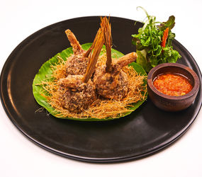 Gourmet Lao appetizer, deep-fried lemongrass stuffed with pork (Ua Si Khai), served at Bistro 1960 in Luang Prabang