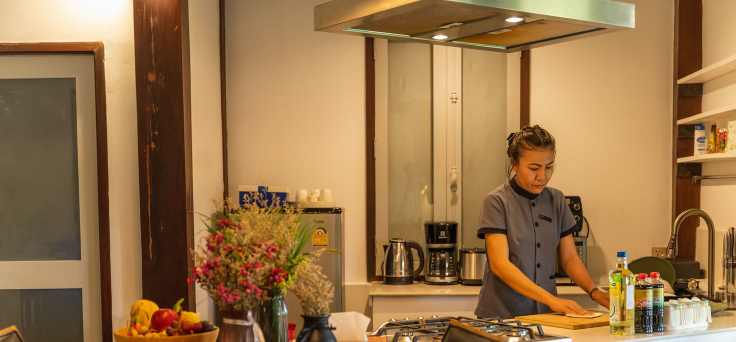 A fully-equipped kitchen of the 2-bedroom riverside villa