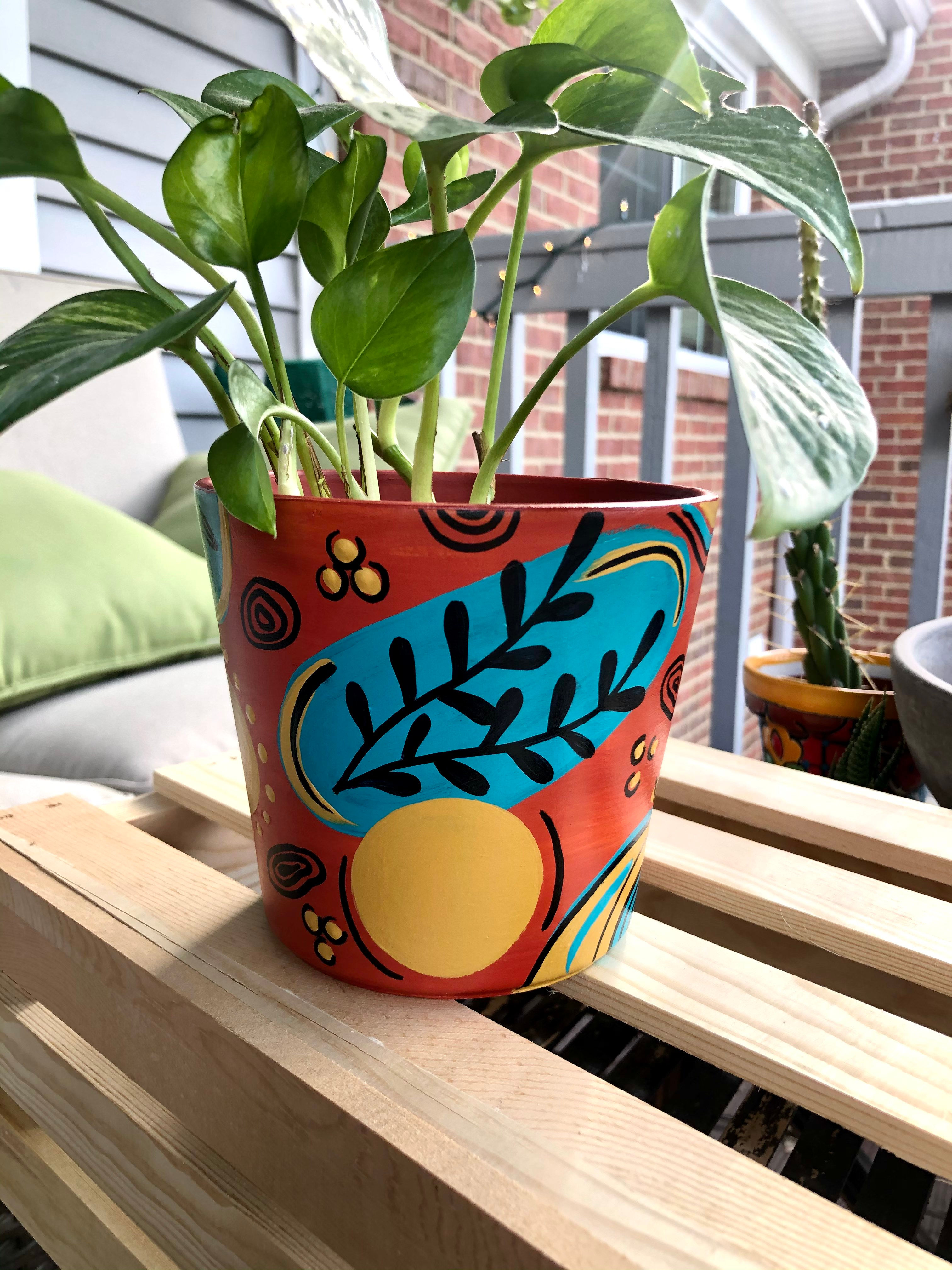 blue + orange abstract sun planter 4.8"