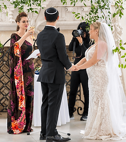 Rena Strober, LA Jewish wedding officiant performing marrying a couple.