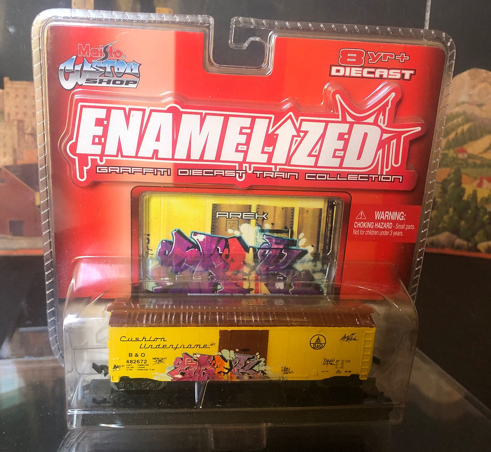 2006 Enamelized Graffiti Diecast Yellow Train "Arek"