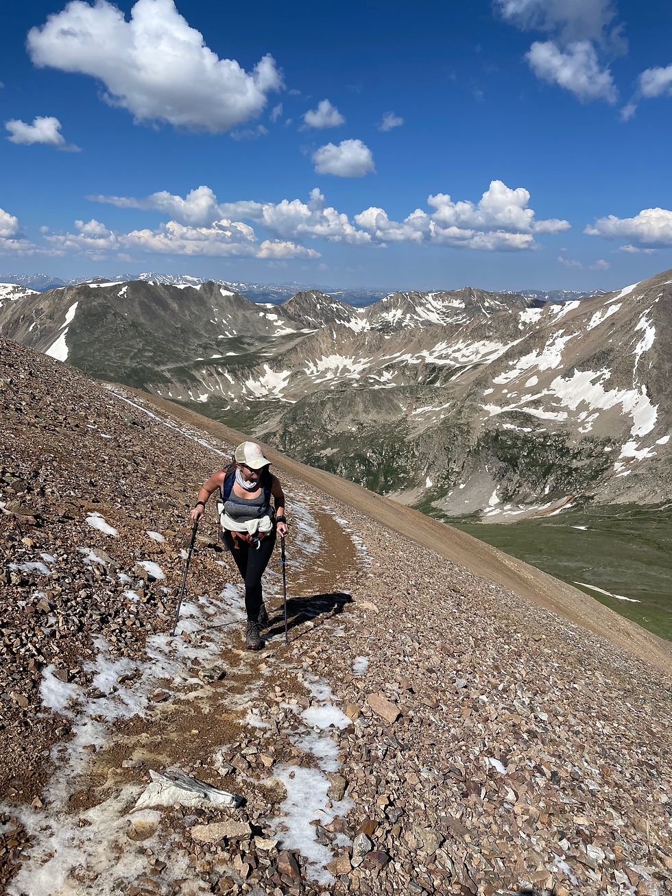 Lauren, making her way to the Mount Lincoln summit of the DeCaLiBron loop in Colorado.