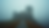 Eye-level view of an ancient castle shrouded in mist