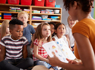 group-of-elementary-school-pupils-sitting-on-floor-2024-10-21-01-35-33-utc.jpg