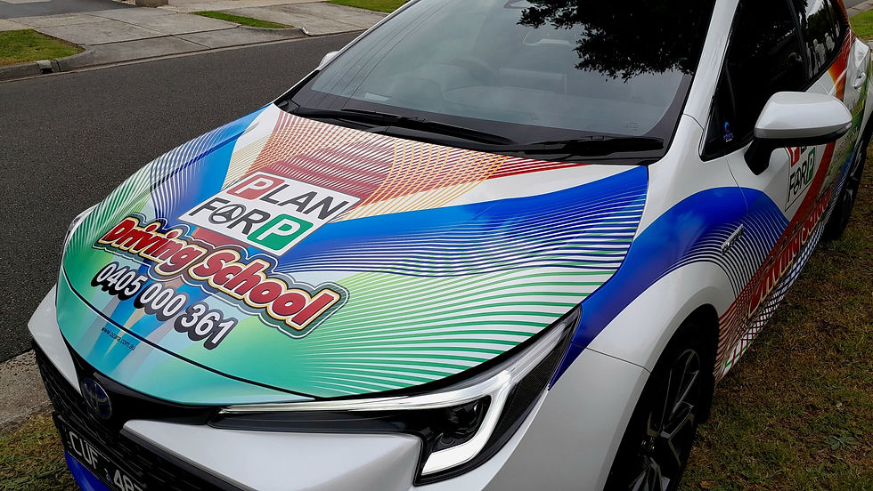 Thumbnail: Toyota-Corolla-Driving-School-Sign-wrap