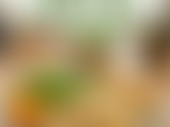 Healthy Olive Garden Alfredo for athletes with whole milk + 2% cottage cheese sauce, grilled chicken strips, crisp Italian salad with olive oil dressing, and warm breadsticks on a family dining table