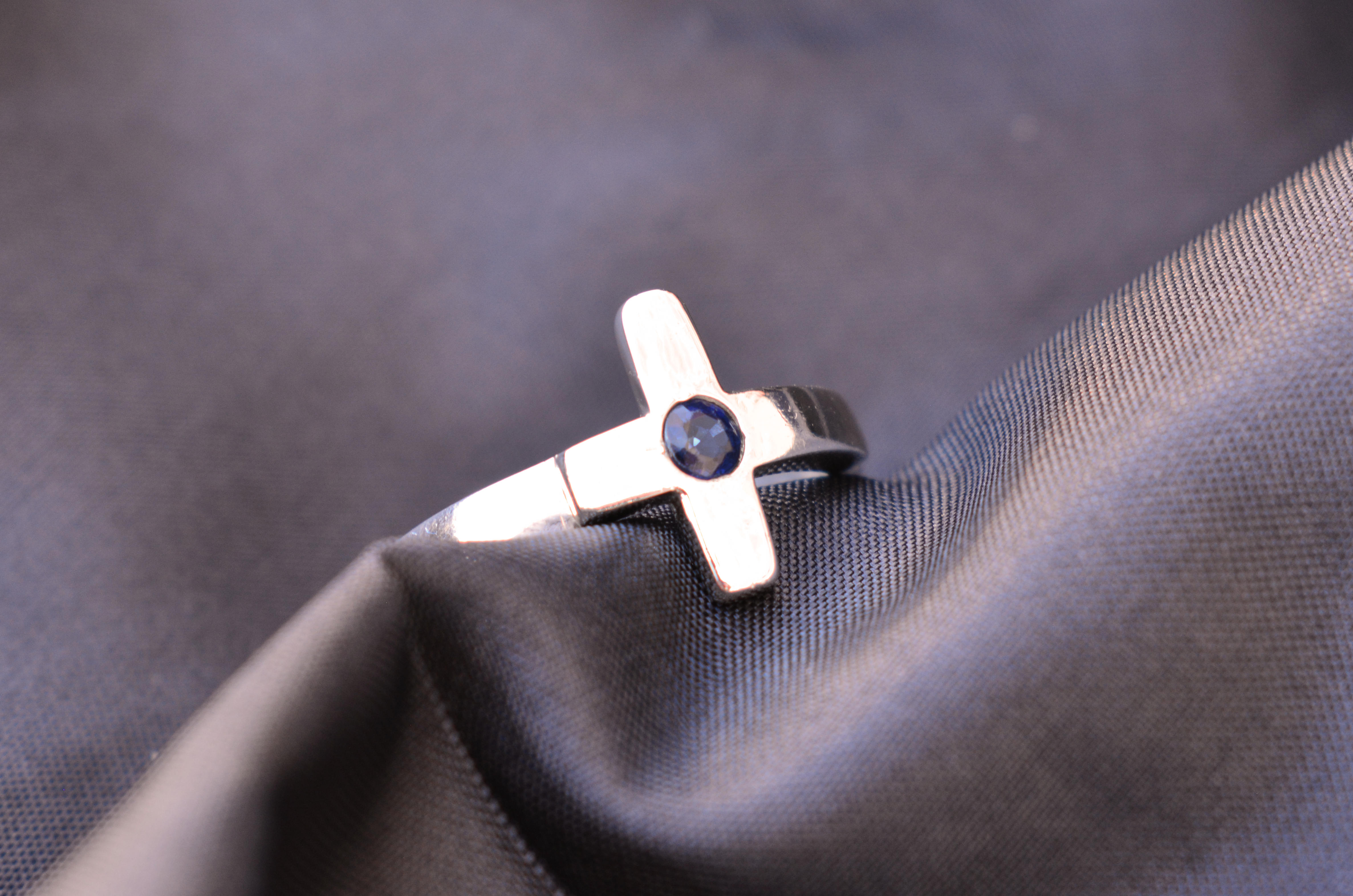 silver ring with blue saphire