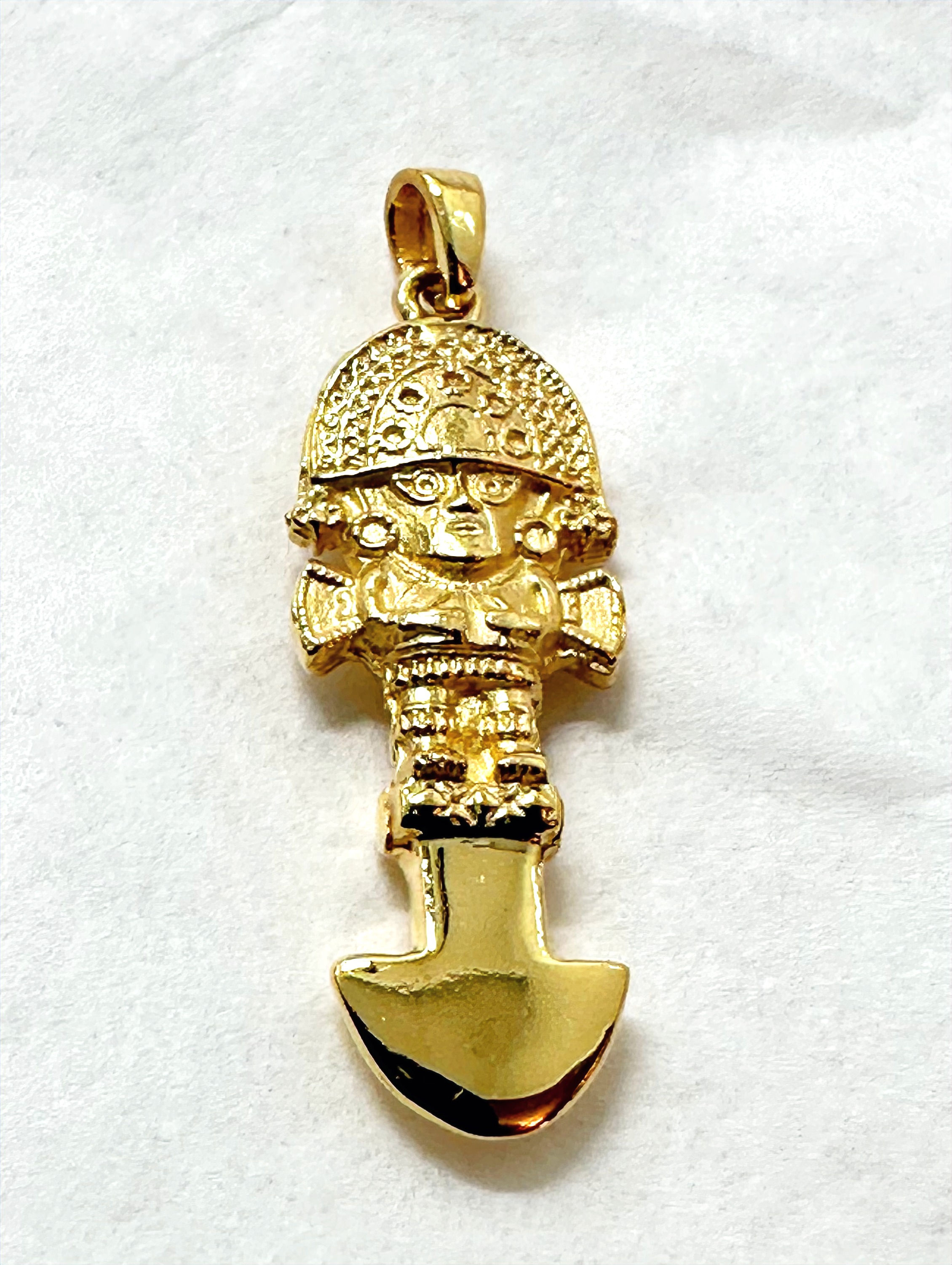 14kt tumi pendant