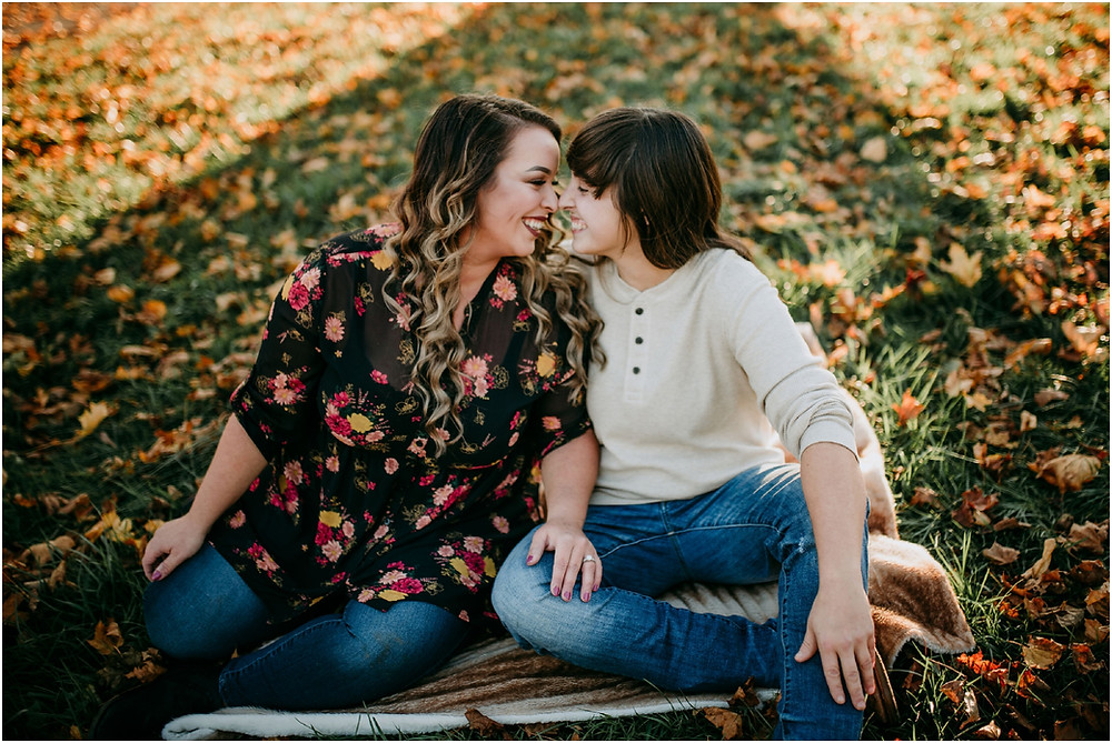 Fall Engagement Session in Maryland with fall leaves and dogs