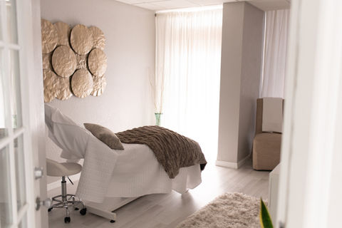 Beautiful light and bright spa treatment room.