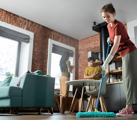 full-shot-people-cleaning-room-together.jpg