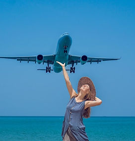 young-woman-beach-landing-planes-travel-concept_247622-10014.jpg