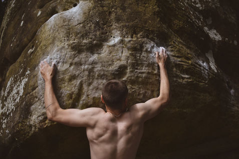 Capture and Edit a collection of photos showcasing climbers in a local climbing area. Demonstrate strength and power.