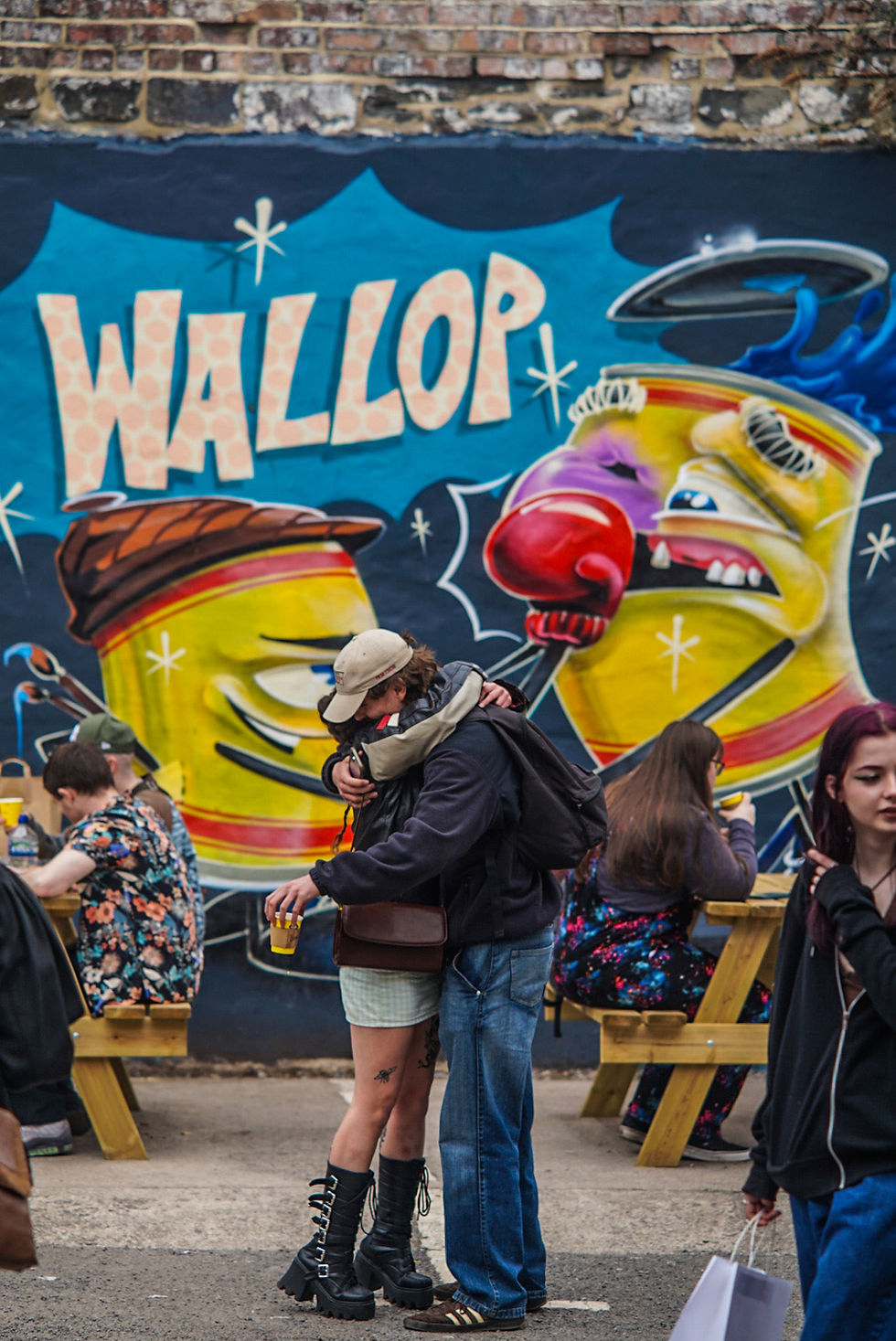 Couple embracing each other in front of a