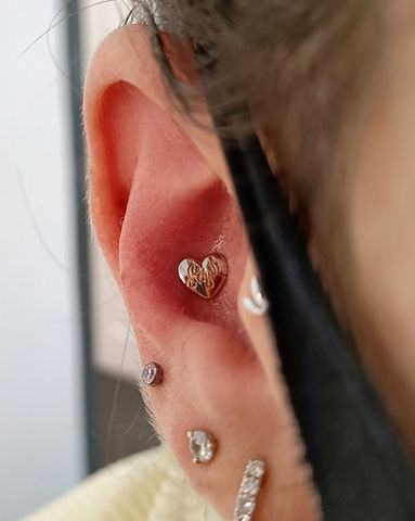 Conch piercing in fife, new piercing with gold jewellery