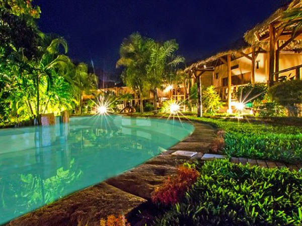 Bungalows and pool at Le Zahir Lodge, Nosy Be, Madagascar
