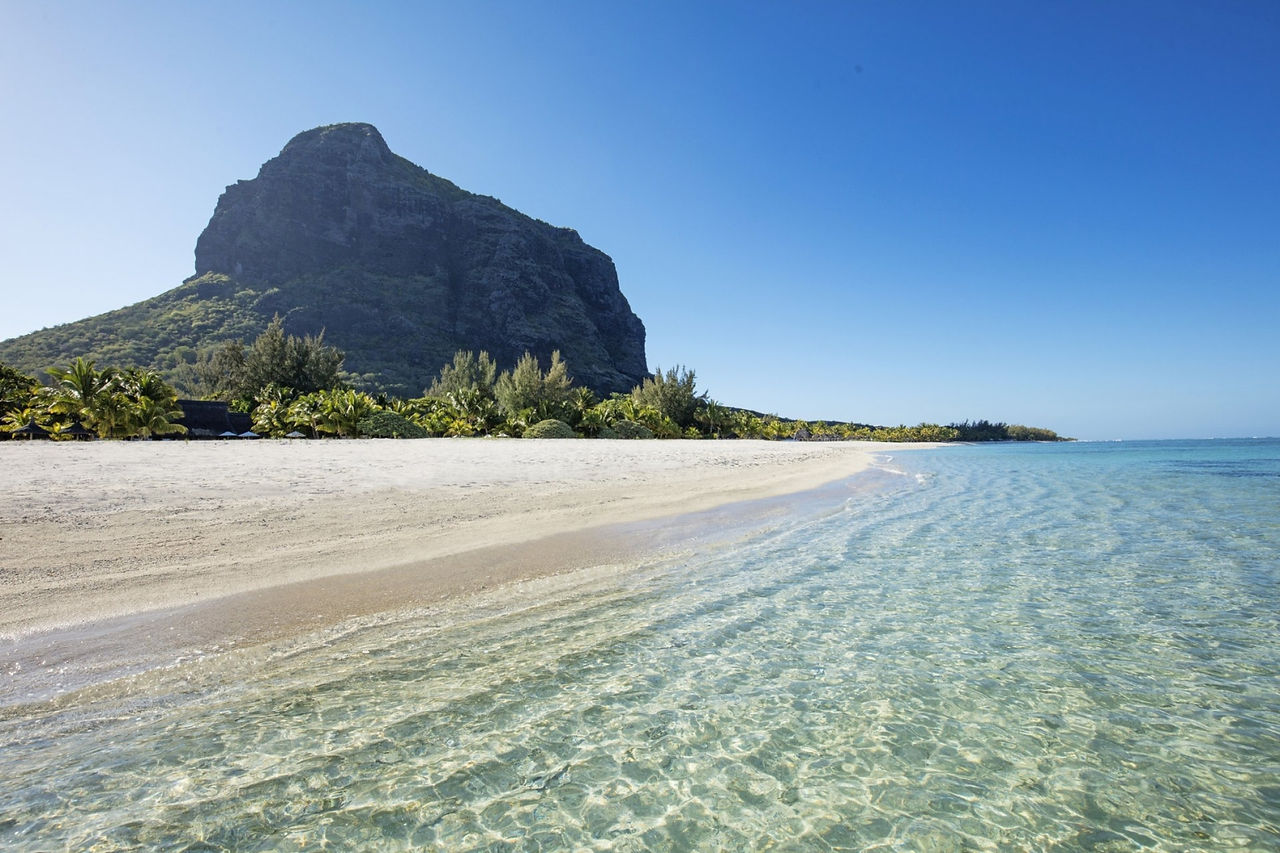 Le Morne mountain backdrop on the beach at Dinarobin Beachcomber Mauritius