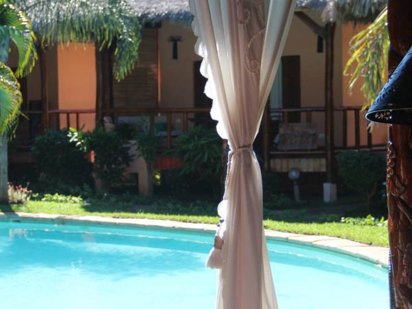 Bungalows and pool at Le Zahir Lodge, Nosy Be, Madagascar