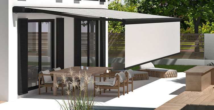 Dark grey cassette awning with beige fabric roll and vario valance.