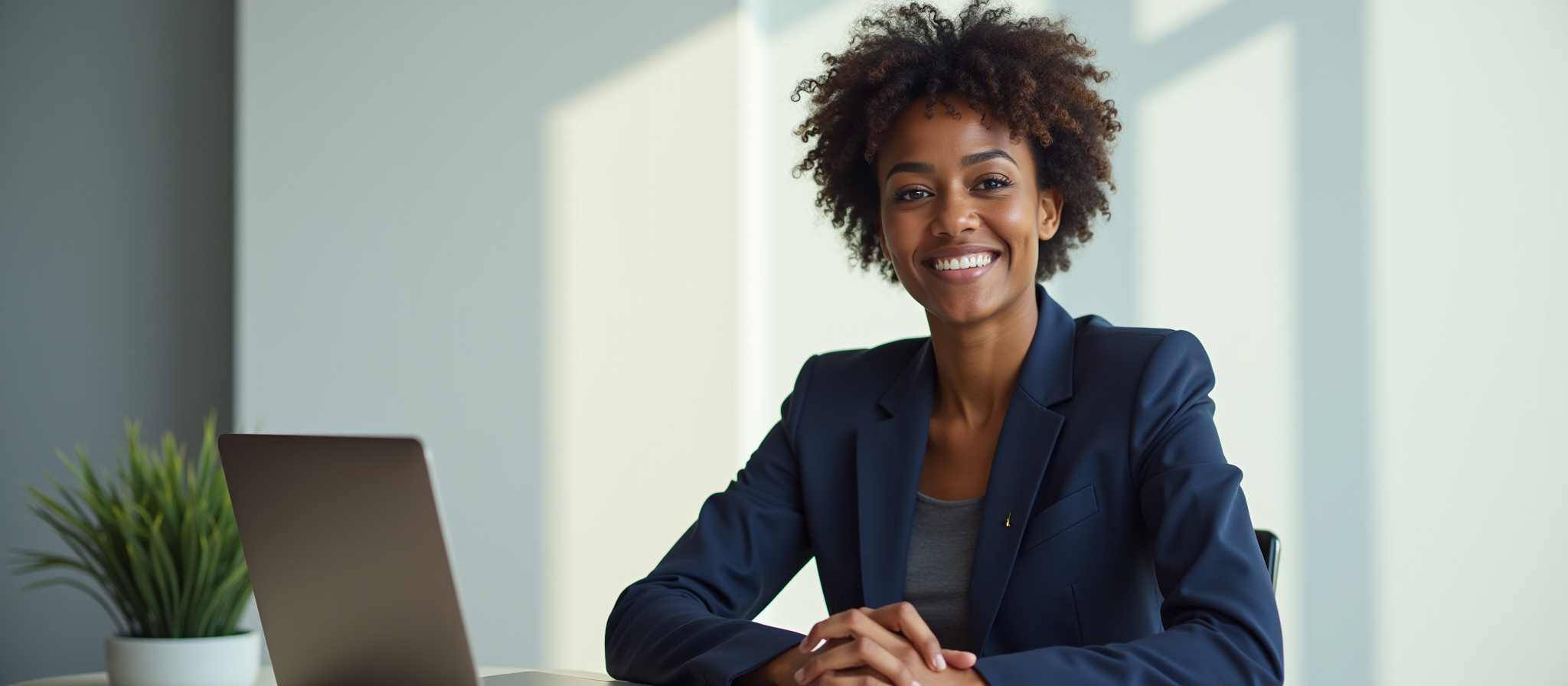 Smiling Black woman in a suit