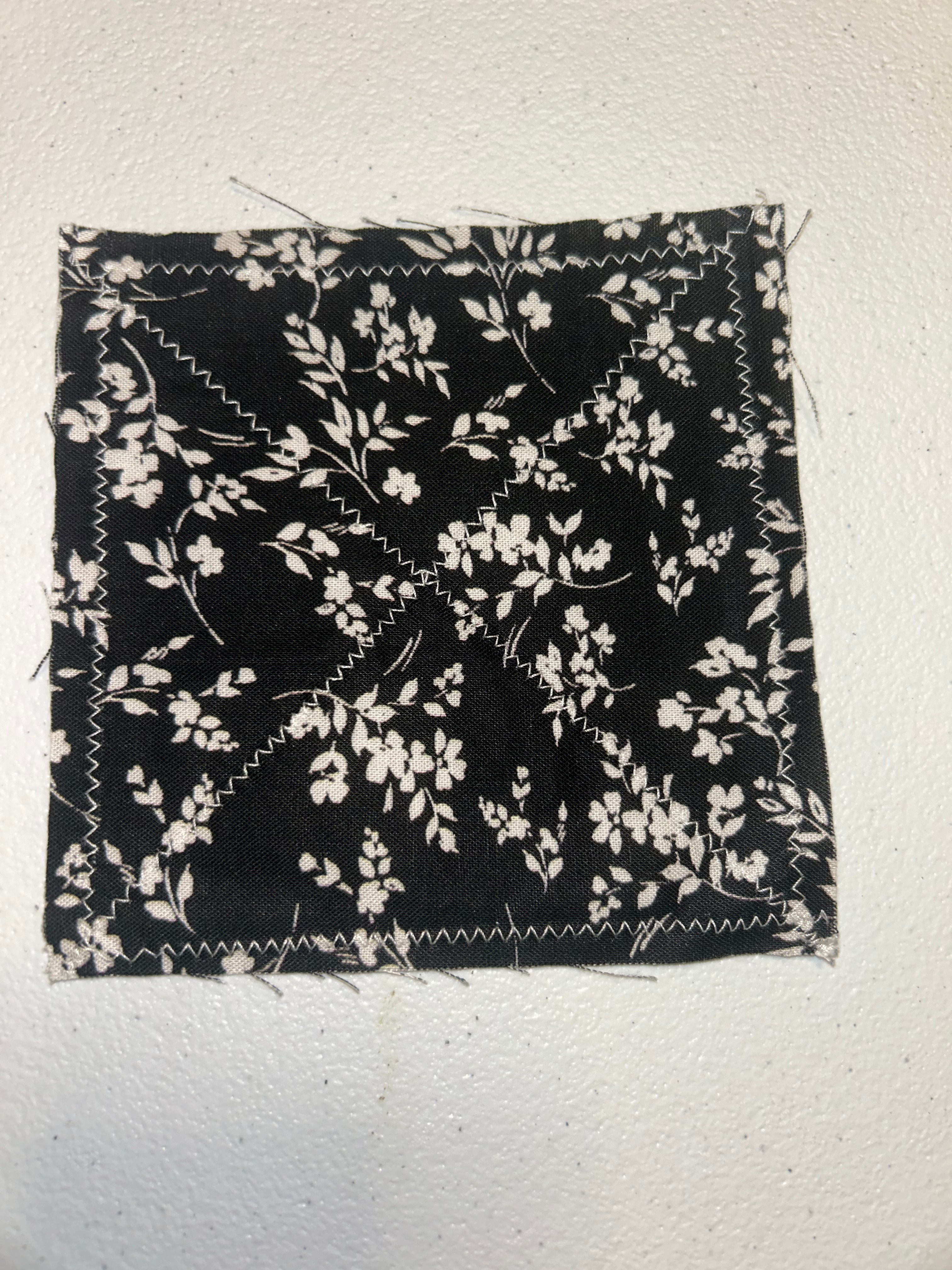 White Floral on Black - Small Jar Opener on Tan