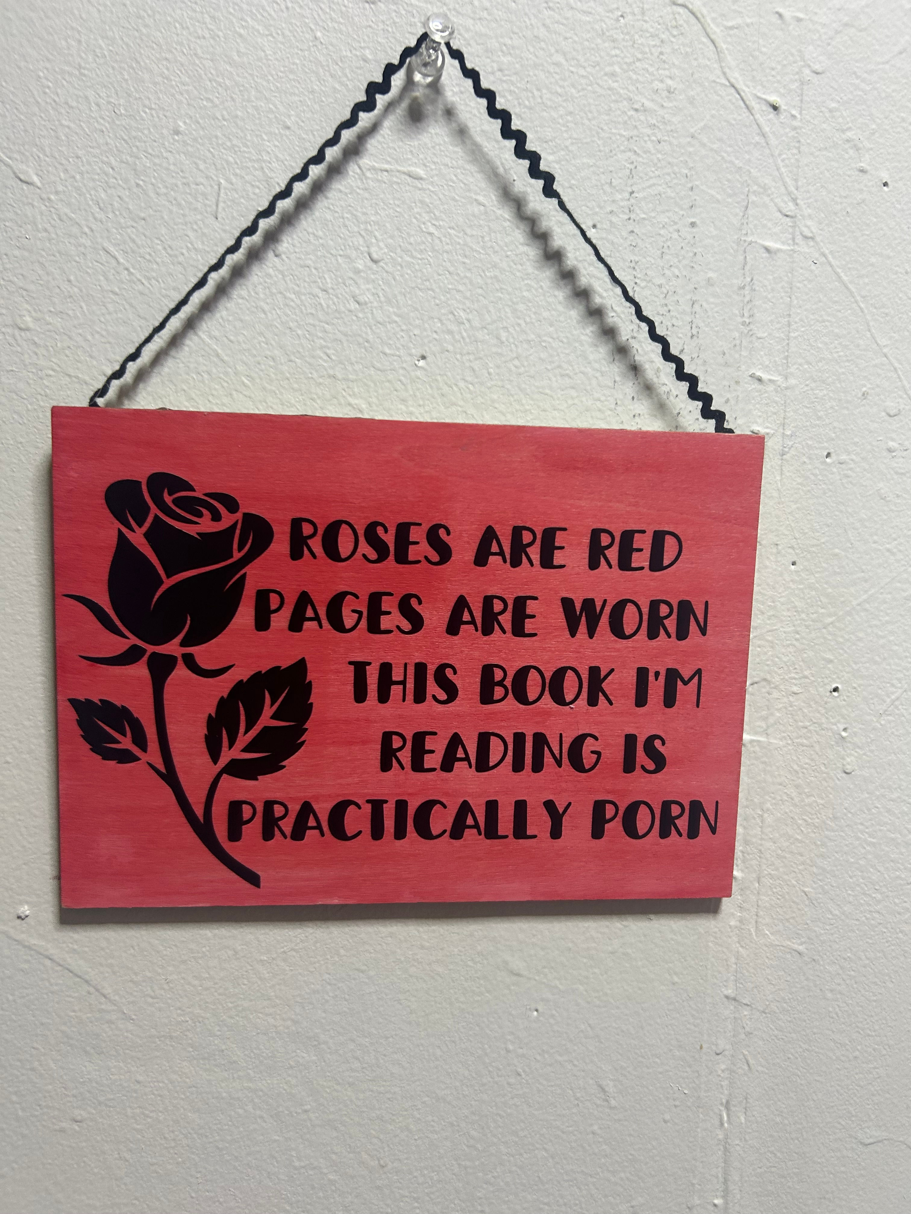 Roses are red pages are worn this book I'm currently reading is practically porn