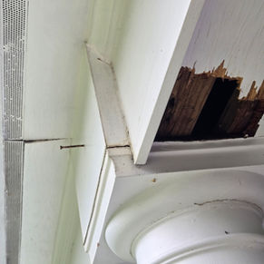 Rotten soffit boxing on a Hampstead, NC home before repair