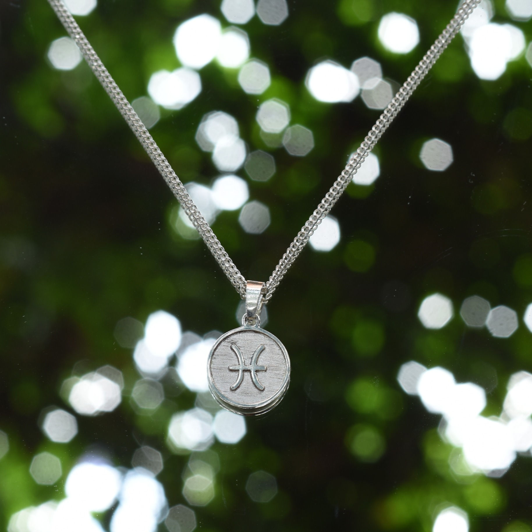 Dije de plata Piscis