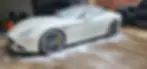 White sports car being washed in McKinney TX gallery.