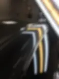 Paintless Dent Repair McKinney on a black car panel.