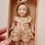Thumbnail: All bisque Painted Eye Googly Doll in Wicker Basket with Costumes