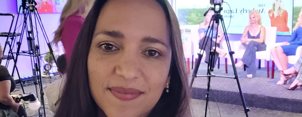 Michele Roys pictured of the backstage of a live podcast recording studio