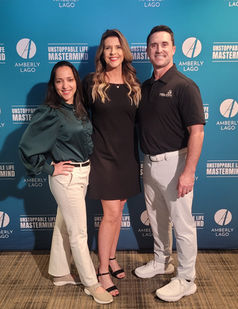 Michele Roys with Becky and Mikal pose to the camera