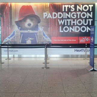 A Picture of Paddinton the bear at the airport in London