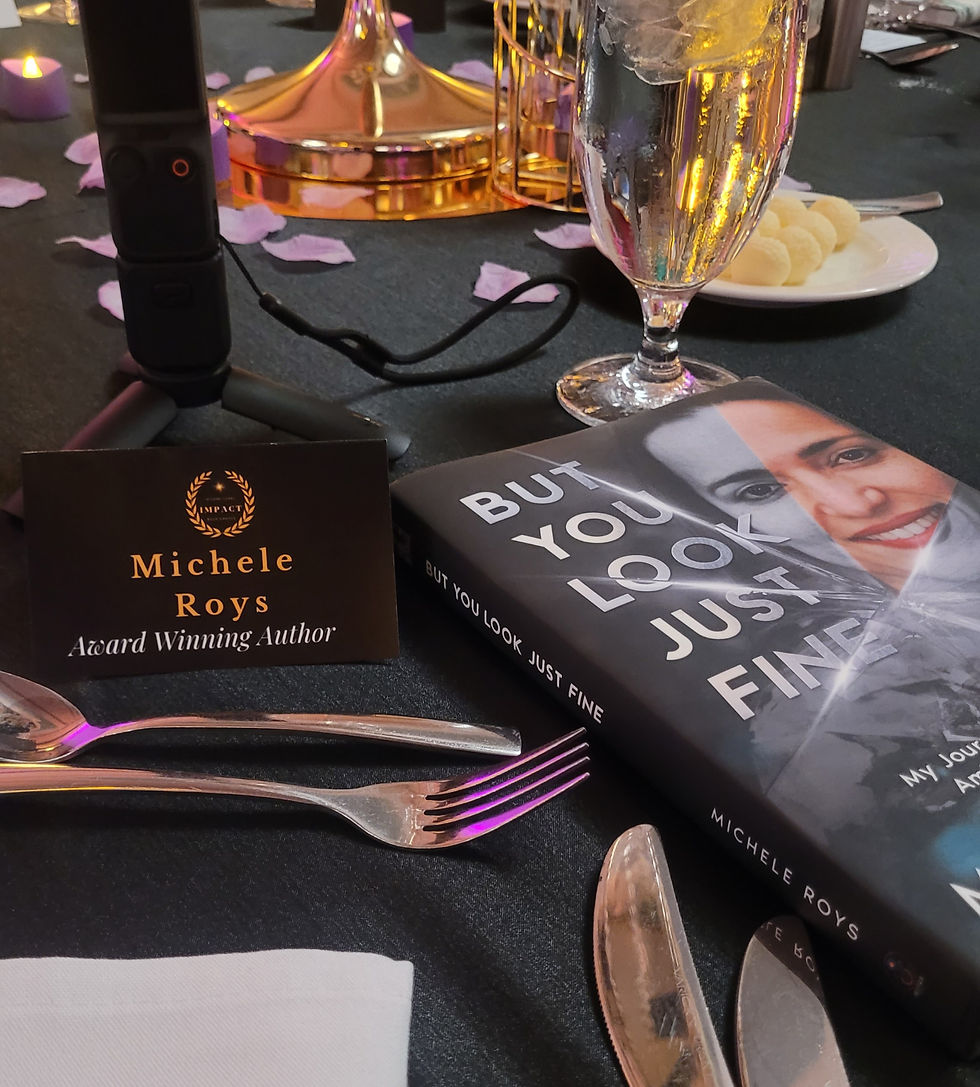 A beautiful table setting with award winning author Michele Roys book and a small table placement card