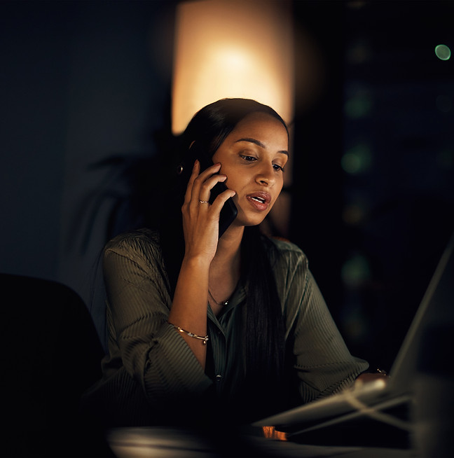 woman-phone-call-feedback-night-business-with-laptop-research-email-report-journalist-blog