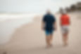 Mature couple walking on the beach