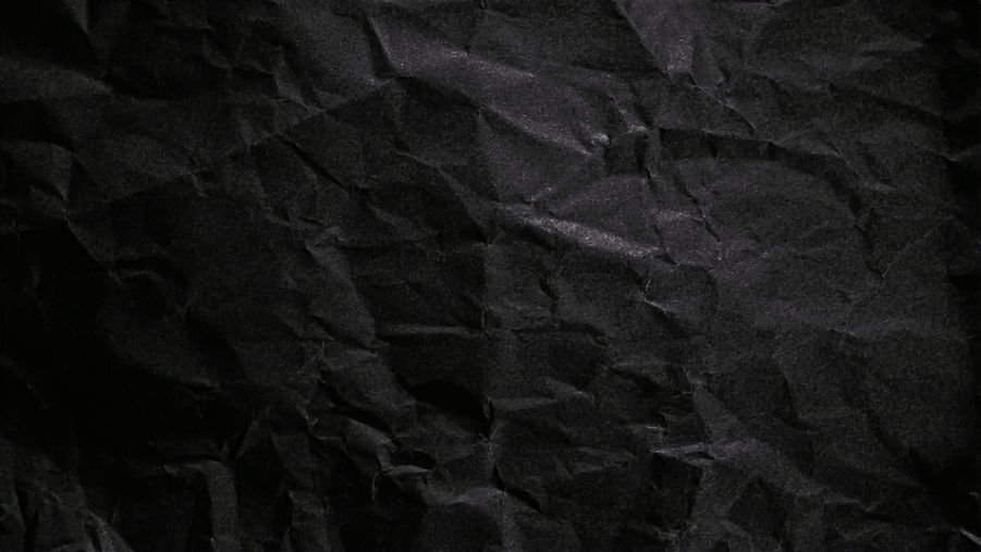 vecteezy_textured-crumpled-black-paper-background_6893584_325_edited.jpg
