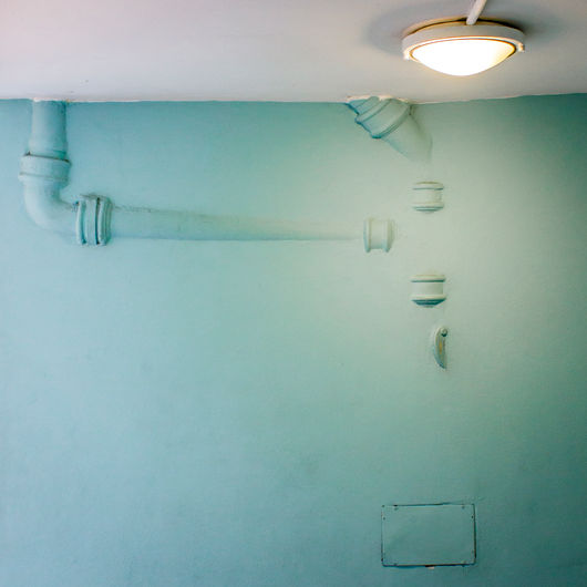 blue wall lamp pipes