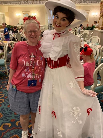jessica harper step into adventure travel specialist wearing disney ears