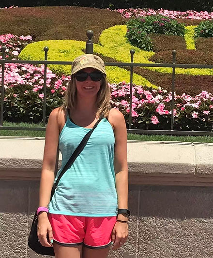 jessica harper step into adventure travel specialist wearing disney ears