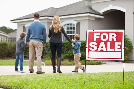 family-looking-at-house-for-sale-58017e4c3df78cbc28251a41.jpg