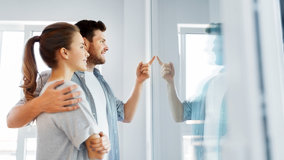 COUPLE LOOKING AT HOME.png