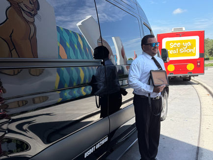 man in front of black van