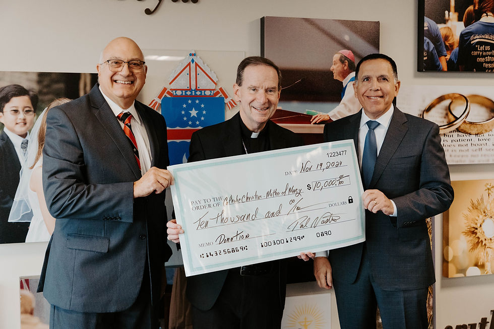 Presentation of Mercy Ride 2024 check to CEO of Catholic Charities Arlington Stephen Carattini (Pictured Right)