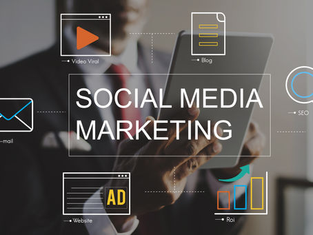 Businessman holding a tablet beside a social media marketing graphic with icons labeled Video Viral, Blog, SEO, E-mail, Website, Roi