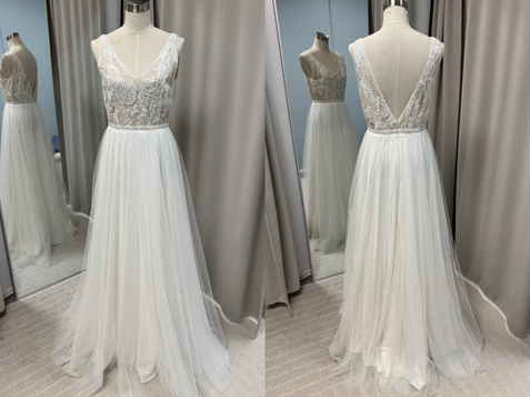 Heidi Tuisku Bridalin Kitty, käyttämätön poistokappale. Ihana helmikirjailtu yläosa ja kevyt tyllihelma. Koko 40, hinta 935€.